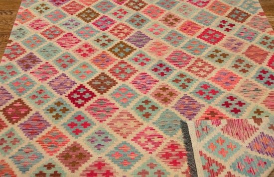 Hand woven flat weave multicolor kilim rug in geometric style. Size 5.2x6.7.