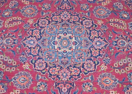 Hand knotted floral design vintage Persian Kashan rug in red color. Rug size 4.6x7.3.