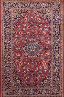 Hand knotted floral design vintage Persian Kashan rug in red color. Rug size 4.6x7.3.