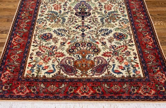 Handmade Persian Sarouk wool rug with tree of life pattern in beige and colors. Size 4.3x6.7.