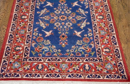 Handmade wool Persian Varamin blue rug with birds and flowers. Rug size 3.5x5.