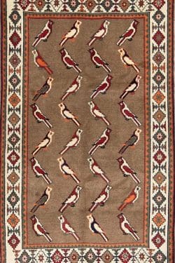 Hand knotted Persian Shiraz wool area rug with sparrows in beige color. Size 4.5x7.