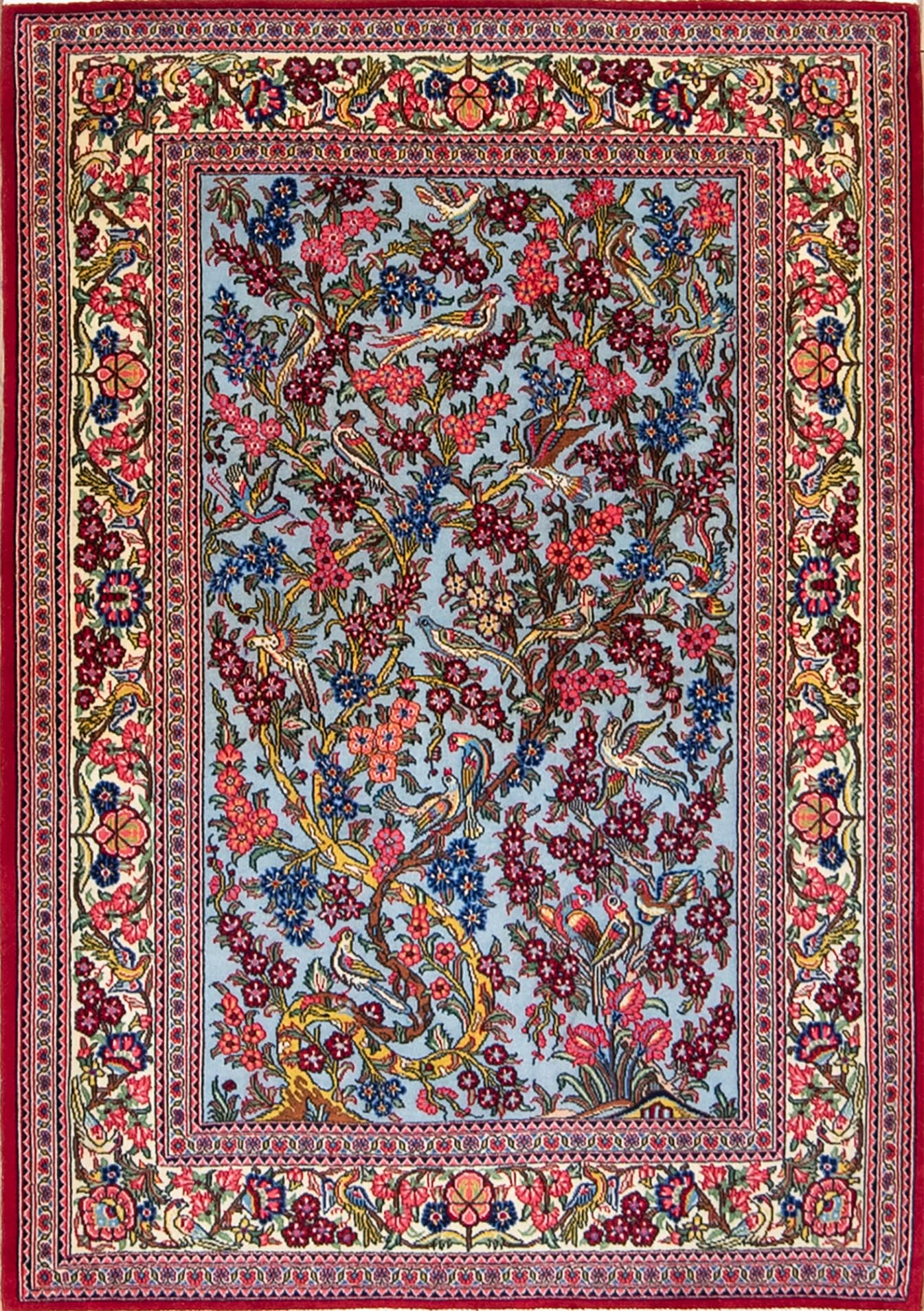 A colorful hand knotted Persian Qum wool area rug with birds and tree of life design. Size 3.7x5.2.