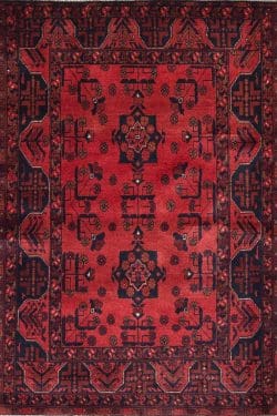 Handmade tribal area rug from Afghanistan with red and black colors. Rug size 3.6x5.1.