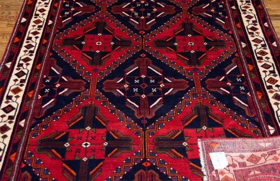 Geometric Persian carpet. Hand knotted Persian Shiraz carpet in red and navy blue colors. Rug size 4.10x7.9.