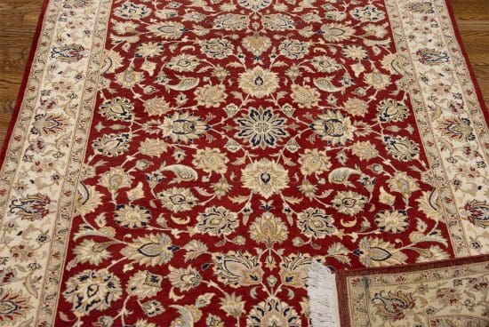 Handmade area rug, floral Kashan design wool are rug in red color. Size 4.2x6.3.