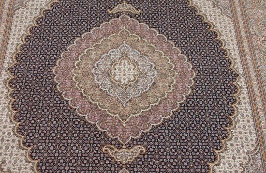 Handmade Persian Tabriz wool and silk area rug in black and green colors. Size 5.3x7.