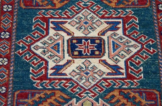 Handmade geometric style super Kazak wool rug in green color. Size 3x4.4.