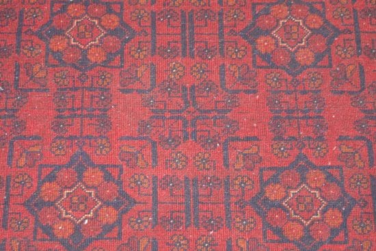 Handmade Afghan tribal wool rug in red color. Size 3.6x5.1.