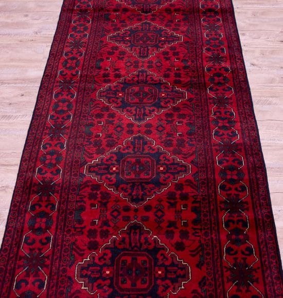 Red color traditional tribal runner rug made of wool. Size 2.8x12.6