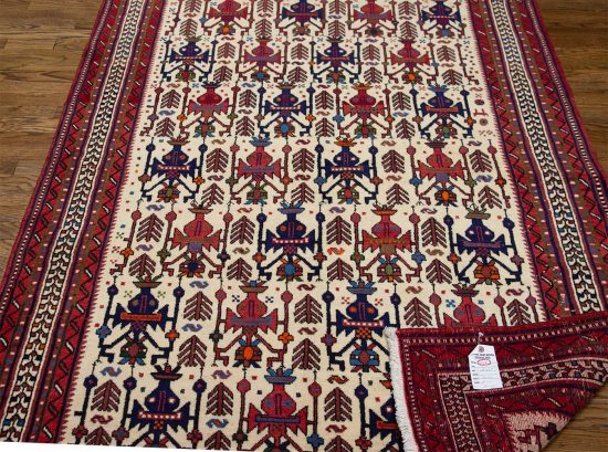 Tribal area rug. A handmade Persian Shiraz wool area rug in beige and red colors. Size 4.7x6.8.