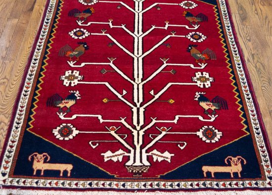 Red Persian rug. A handmade tribal style tree of life rug with goats and roosters in red color. Size 3.8x5.5.