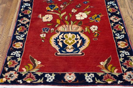 Wool rug. Hand woven Persian Shiraz rug with a vase and flowers with terracotta color. Size 3.4x5.