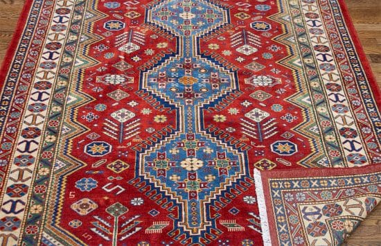 Red oriental rug. Handmade geometric style oriental rug in red and blue colors. Size 5x6.6.