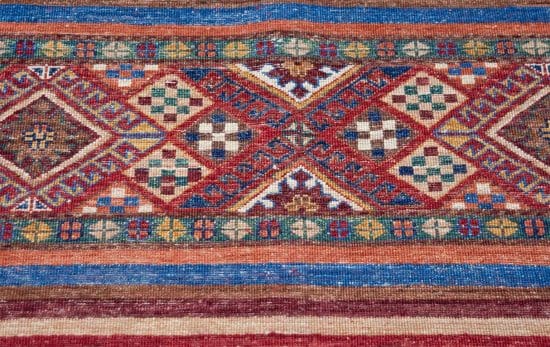 Handmade Afghan tribal area rug style with stripes, multicolor and made of wool. Size 9.3x11.10.