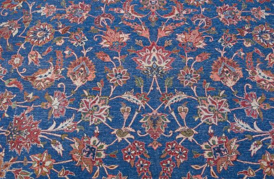 Vintage Persian Isfahan rug. Handmade wool Persian Isfahan rug, floral allover design in blue and terracotta color. Size 10x14.