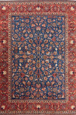 Vintage Persian Isfahan rug. Handmade wool Persian Isfahan rug, floral allover design in blue and terracotta color. Size 10x14.