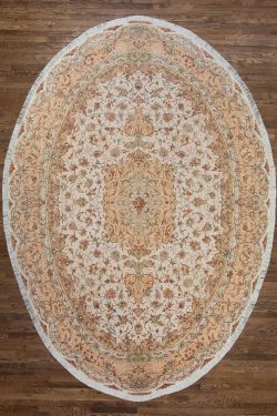 Oval Persian rug, Handmade wool and silk Persian Tabriz oval rug in beige and salmon colors. Size 8.5x11.10.