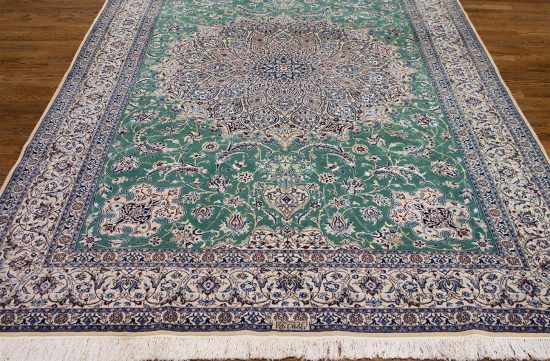 Persian Nain rug. Hand knotted Habibian Nain wool and silk rug in green color with 625 KPSI. Size 6.9x10.