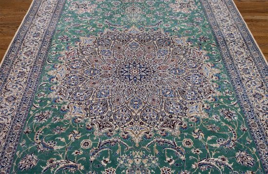 Persian Nain rug. Hand knotted Habibian Nain wool and silk rug in green color with 625 KPSI. Size 6.9x10.