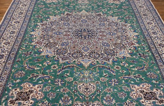 Persian Nain rug. Hand knotted Habibian Nain wool and silk rug in green color with 625 KPSI. Size 6.9x10.