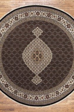 Round area rug. Handmade wool round area rug in black and white color made in India. Rug size is 8.4x8.4.