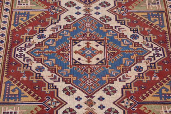 Small oriental rug. Hand woven Caucasian style wool rug in red color made in Pakistan. Size 4.10x7.8.