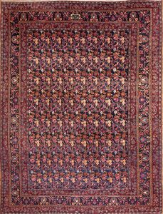 Old Persian Birjand Dorokhsh rug. Floral allover design Persian rug, multi color with navy blue background. Size 10x13.4.