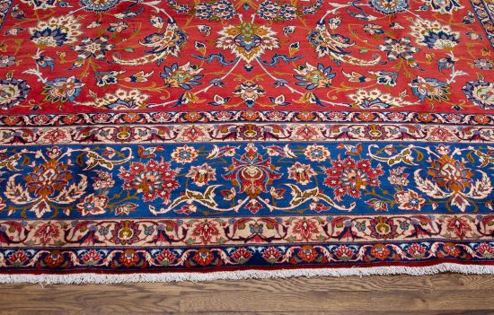 Persian floral rug. Hand knotted Persian Isfahan floral wool rug in orange red and blue colors. Size 10.9x14.6.