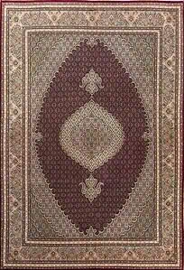 Medium rugs vesatile for variety of spaces. Persian Tabriz wool and silk rug in red color and medium size.