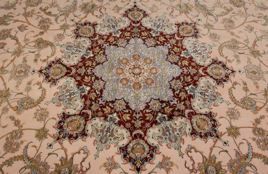 Luxury fine Persian rug. A beautiful hand knotted authentic Persian Isfahan rug made of kork wool and silk in beige, gold, and maroon colors. Size 11.9x17.