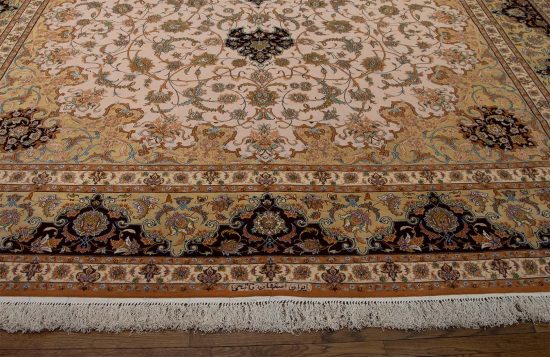 Luxury fine Persian rug. A beautiful hand knotted authentic Persian Isfahan rug made of kork wool and silk in beige, gold, and maroon colors. Size 11.9x17.