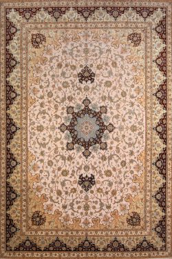 Luxury fine Persian rug. A beautiful hand knotted authentic Persian Isfahan rug made of kork wool and silk in beige, gold, and maroon colors. Size 11.9x17.