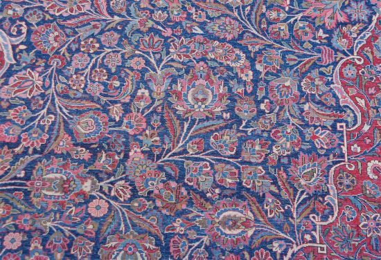 Real Persian rugs. A magnificent vintage floral Persian Kashan rug in navy blue and red border. Size 10.4x14.