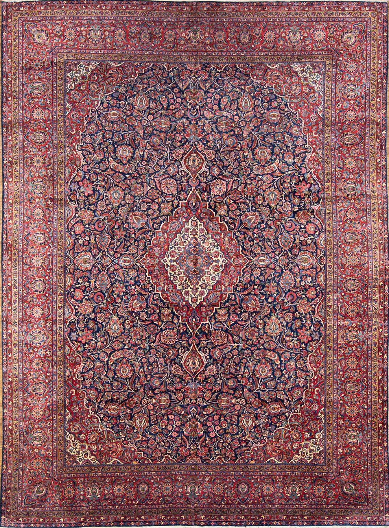 Real Persian rugs. A magnificent vintage floral Persian Kashan rug in navy blue and red border. Size 10.4x14.