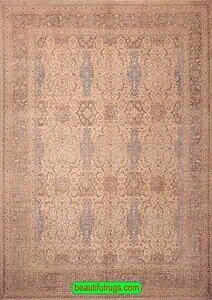 Hand woven oriental wool rug with beige and turquoise colors. Size 8.9x11.10.