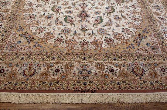 Beige Persian silk rug. Beautiful hand knotted genuine Persian Isfahan rug, multicolor in beige earth-tone. Size 8.8x11.9.