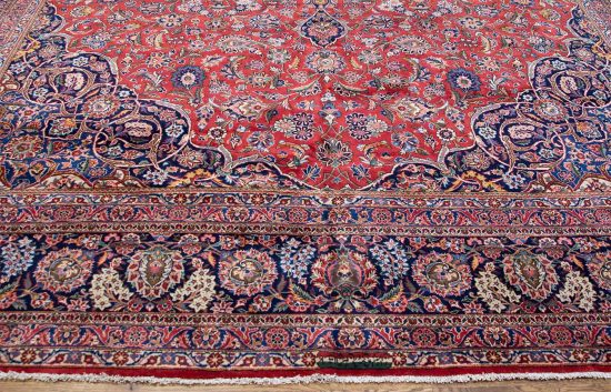 Antique Persian Kashan rug with red and navy-blue colors. Size11.5x18.2.