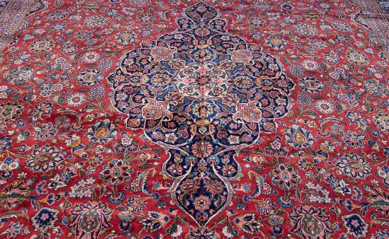 Antique Persian Kashan rug with red and navy-blue colors. Size11.5x18.2.