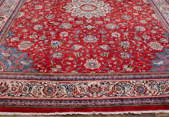 Large area rug. Hand woven floral Persian Sarouk rug in red color made of wool. Size 10.9x14.4.