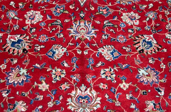 Large area rug. Hand woven floral Persian Sarouk rug in red color made of wool. Size 10.9x14.4.