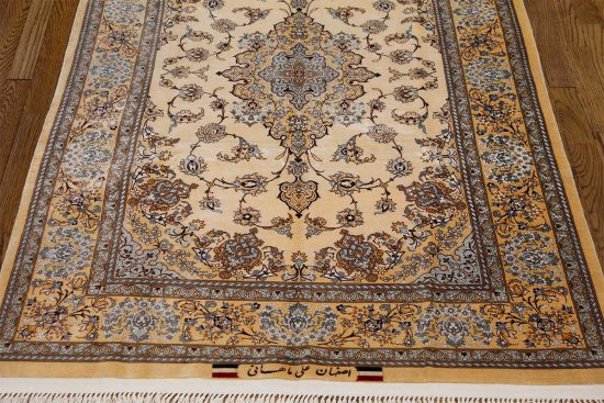 Hand knotted Persian Isfahan pastel rug made of pure silk. Size 3.7x5.8.