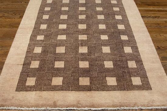 Brown area rugs made of 100% wool with color combination of brown and beige.