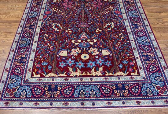 Hand knotted Yazd Persian carpet with tree of life design in traditional red and navy blue colors made of wool. Size 5x8.6.Size 5x8.6.