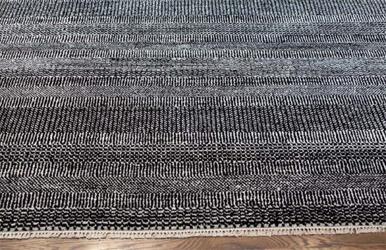 Black and white area rugs with stripes made of combination of wool and synthetic fibers. Size 8x9.8.