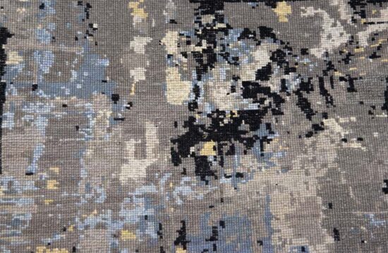 Decorative abstract area rug in black and blue colors made of wool and synthetic fibers. Size 5.2x7.5.