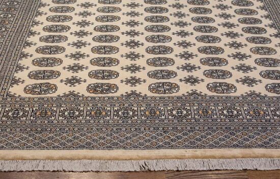 Bokara rug 8x10, traditional style elephant footprint rug in beige color made in Pakistan.