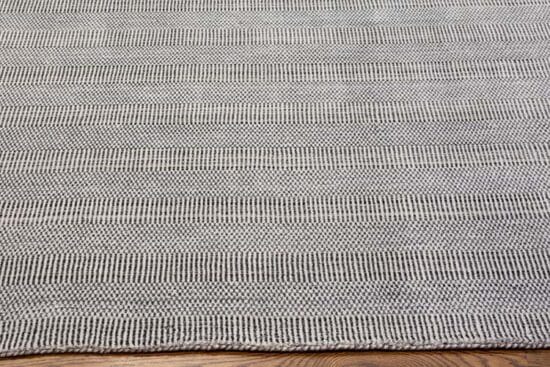 Contemporary area rug crafted in India, grey rug 8x10 made of wool.