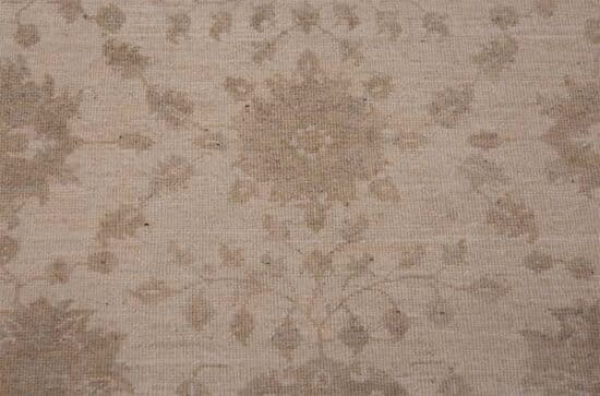 Oriental rug, floral taupe and cream oriental rug made from wool. Size 5x6.4.