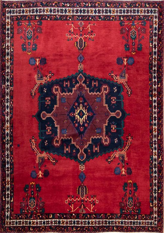 2644- Handmade Tribal Area Rug from Persia’s Sirjan region, woven in fine wool with a deep red field and bold navy medallion. This traditional Persian rug embodies timeless elegance and enduring craftsmanship, a true statement of Persian artistry. Available at Beautiful Rugs Chicago.